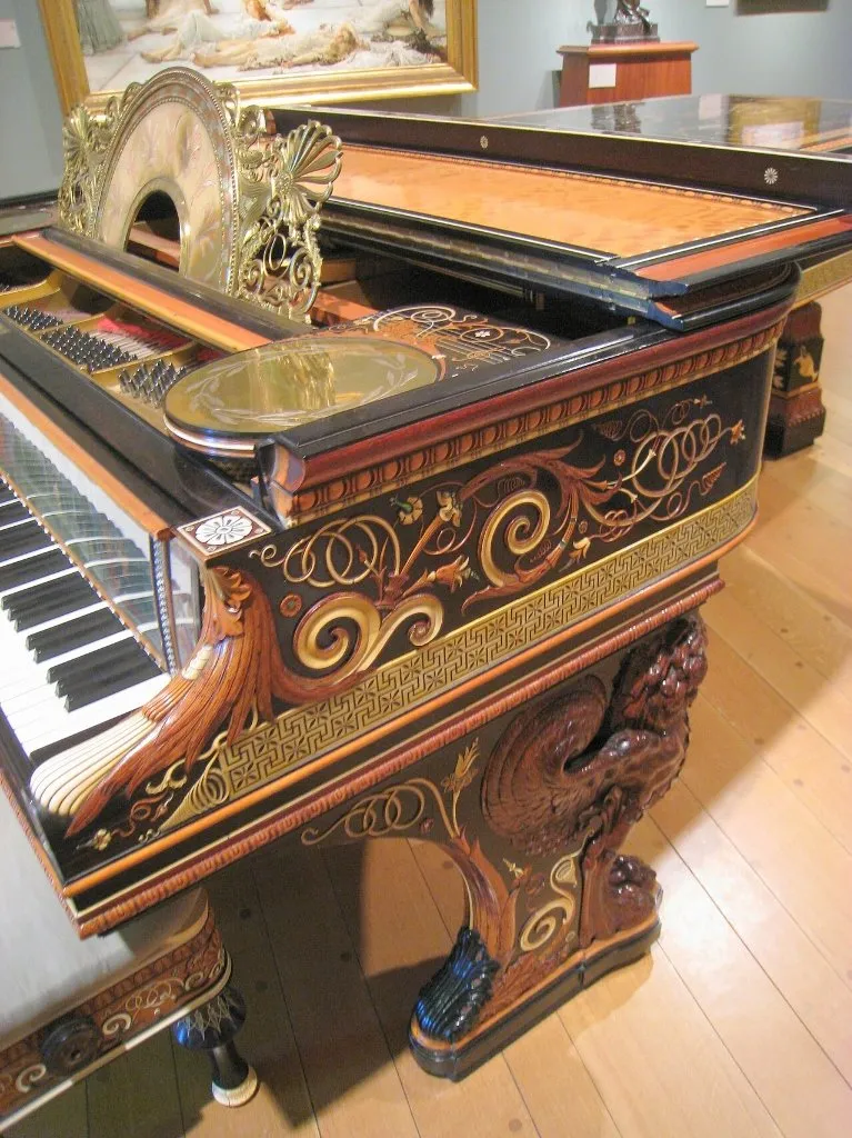 Carved carved lion leg of the Alma Tadema Steinway piano